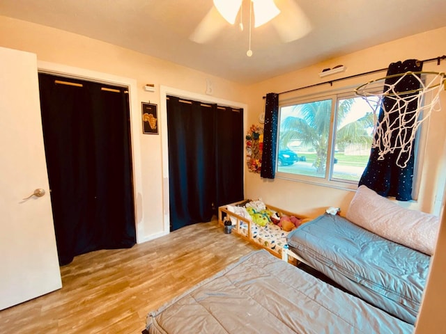 sitting room featuring ceiling fan and light hardwood / wood-style floors