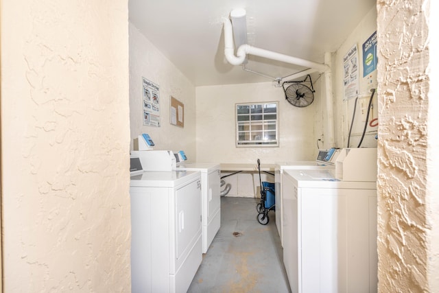 laundry room featuring washer and clothes dryer