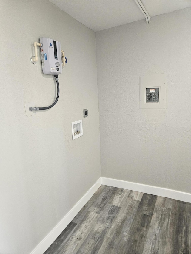 clothes washing area with hookup for an electric dryer, dark hardwood / wood-style flooring, and hookup for a washing machine