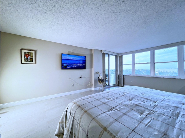 bedroom featuring a textured ceiling