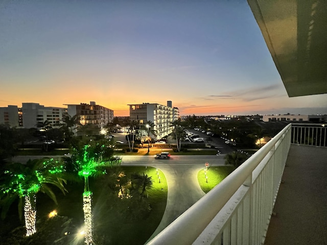 view of balcony at dusk