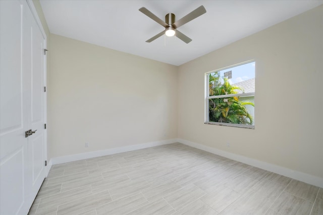 unfurnished room featuring ceiling fan