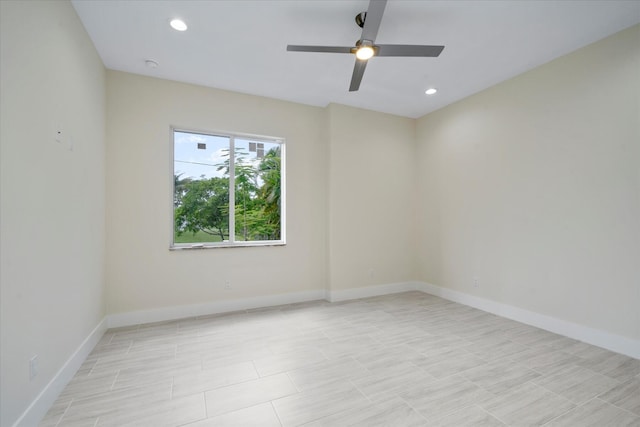 unfurnished room featuring ceiling fan