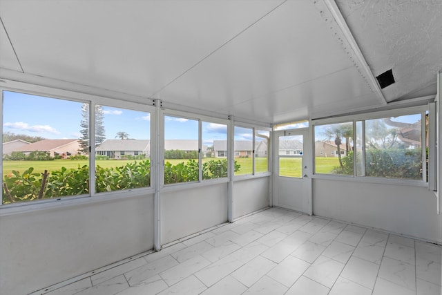 view of unfurnished sunroom