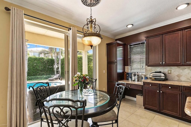 tiled dining area with ornamental molding