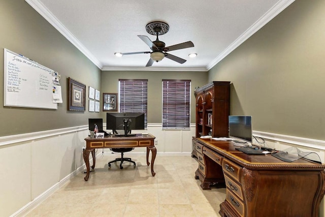 tiled home office featuring crown molding, ceiling fan, and a textured ceiling