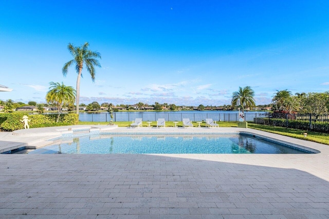 view of pool featuring a water view