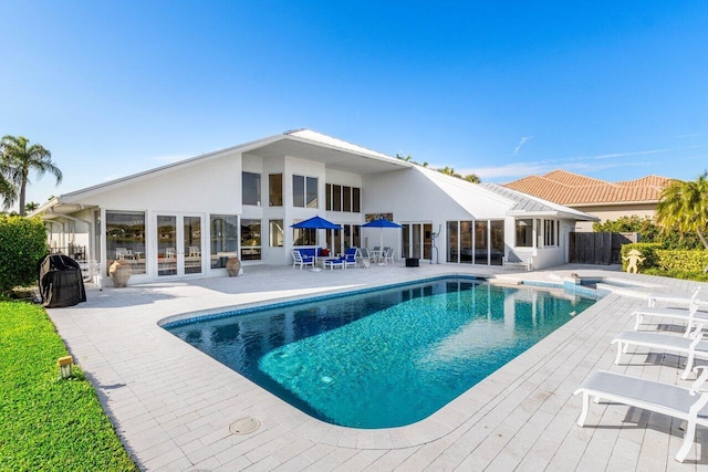 view of pool featuring a patio