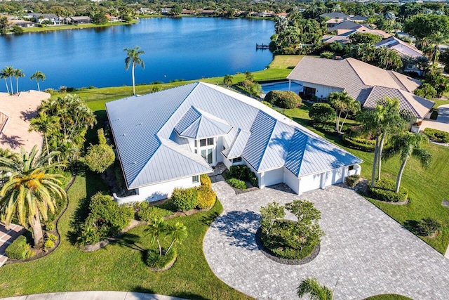 birds eye view of property featuring a water view