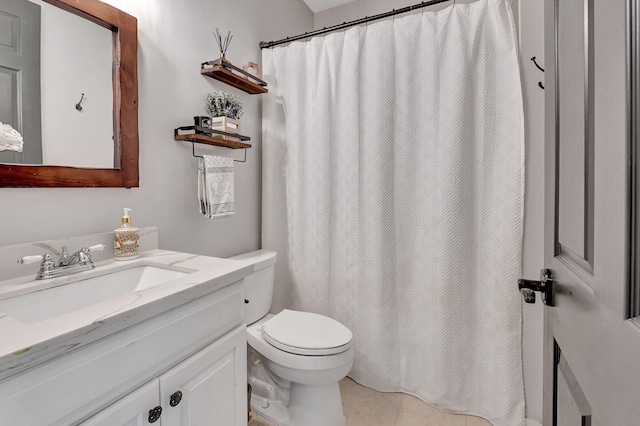 bathroom with tile patterned flooring, vanity, toilet, and a shower with shower curtain