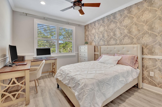 bedroom with ceiling fan, light hardwood / wood-style flooring, and ornamental molding