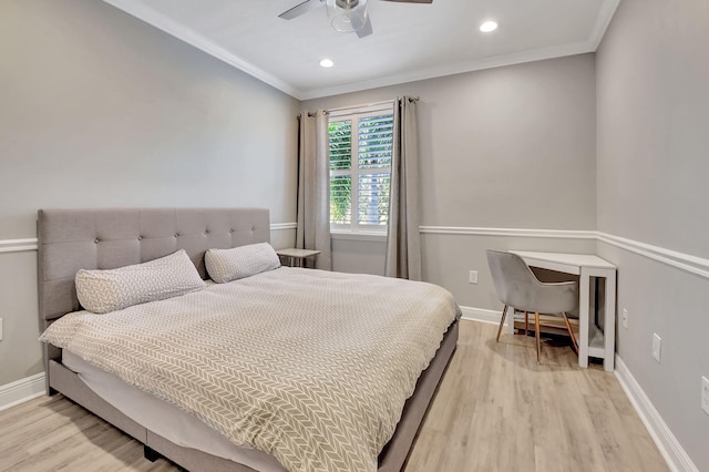 bedroom with ceiling fan, crown molding, and light wood-type flooring