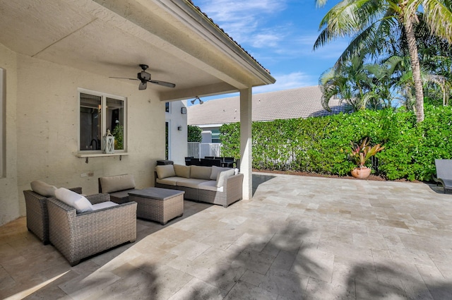 view of patio with ceiling fan and an outdoor hangout area