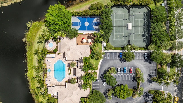 birds eye view of property featuring a water view