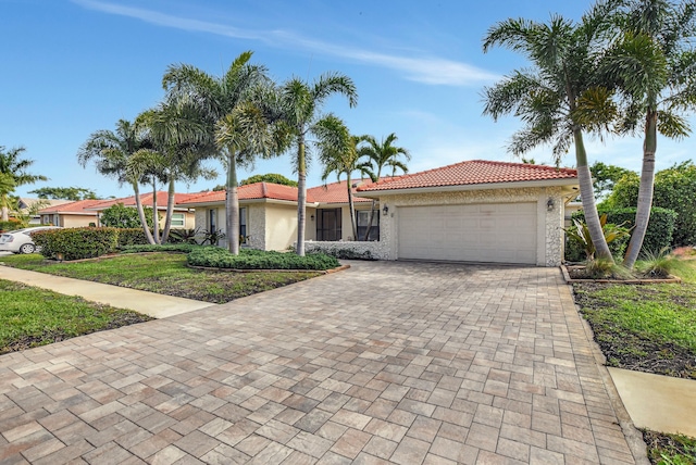 view of front of home with a garage