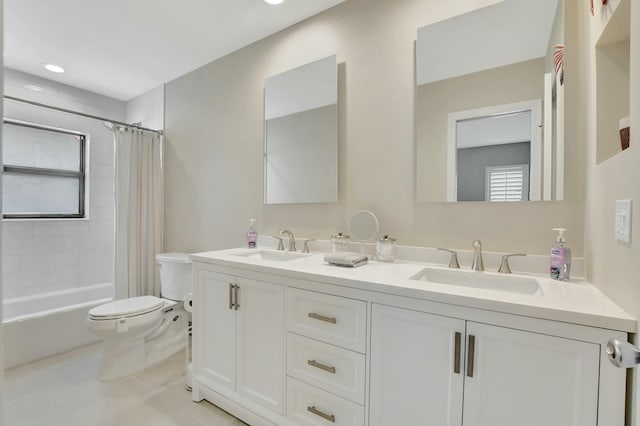 full bathroom featuring tile patterned floors, shower / bath combo, toilet, and vanity