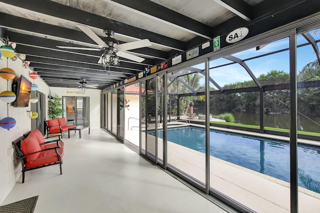 view of pool featuring ceiling fan