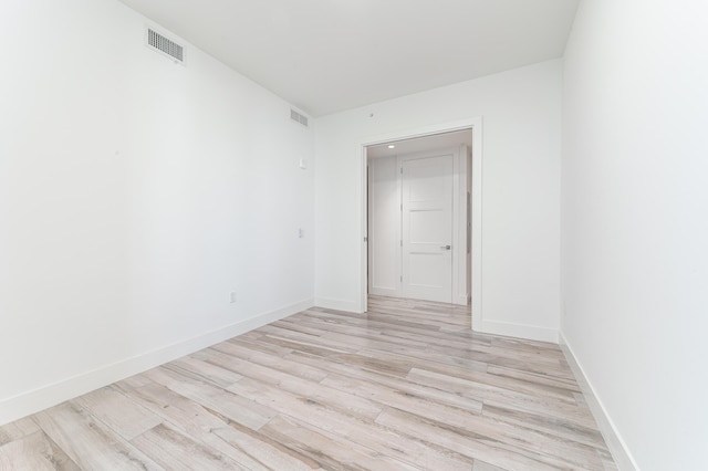 unfurnished room featuring light hardwood / wood-style flooring