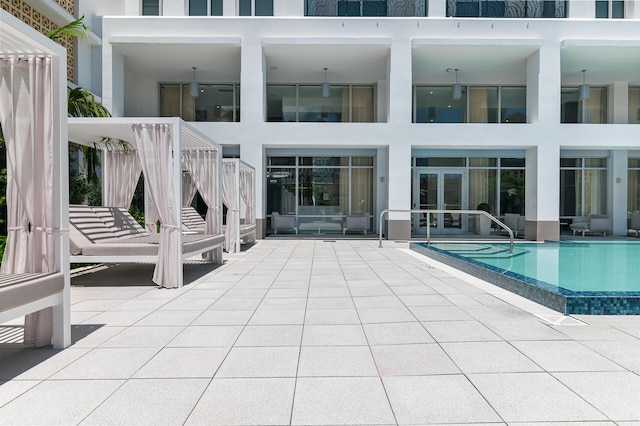 rear view of house featuring a patio