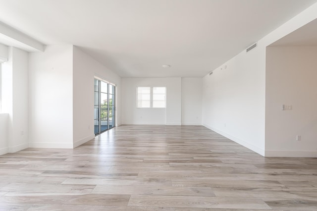 empty room featuring light hardwood / wood-style floors