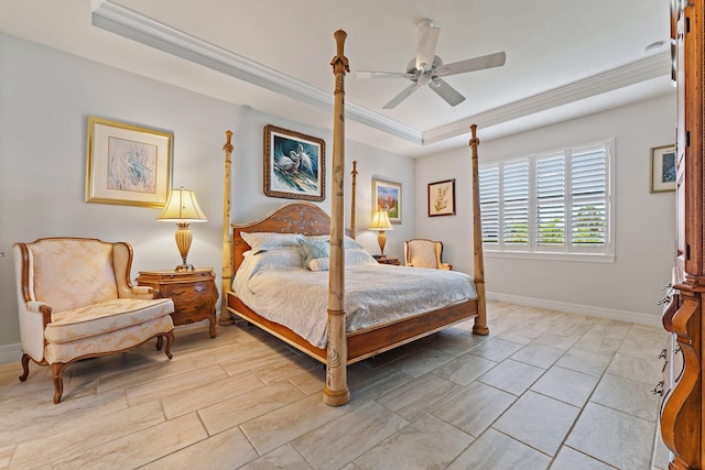 bedroom featuring ceiling fan, a raised ceiling, and crown molding