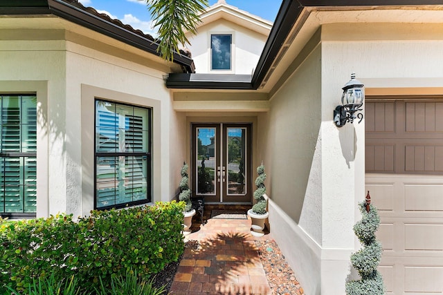 doorway to property featuring french doors