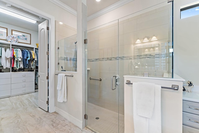 bathroom featuring crown molding and walk in shower