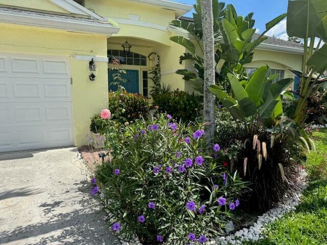 doorway to property featuring a garage