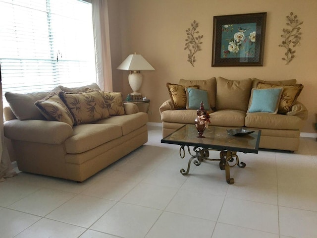 living room with light tile patterned flooring