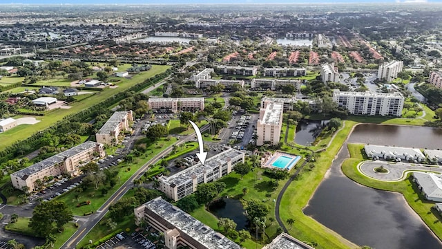 birds eye view of property featuring a water view