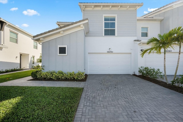 view of front of home with a garage