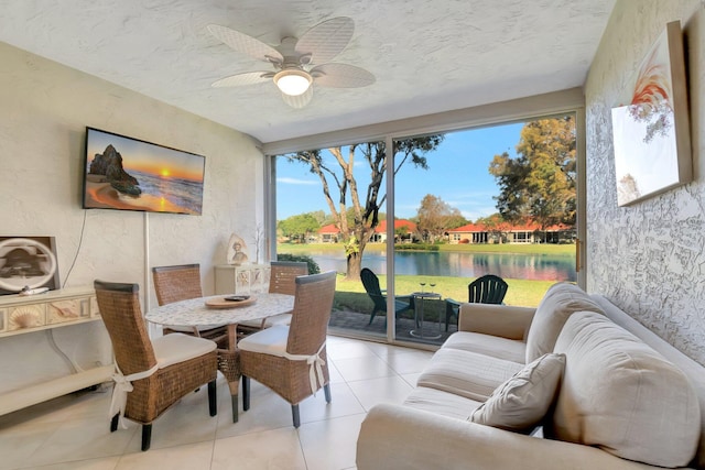 interior space featuring a wealth of natural light and ceiling fan