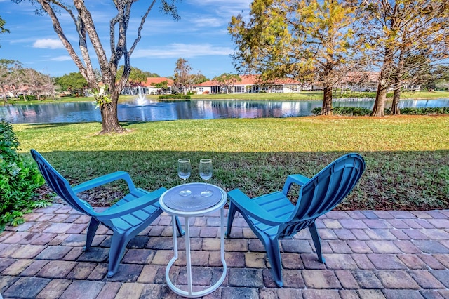 view of patio / terrace with a water view