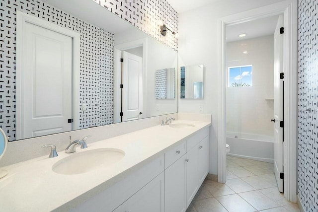 full bathroom with tile patterned flooring, vanity, bathtub / shower combination, and toilet