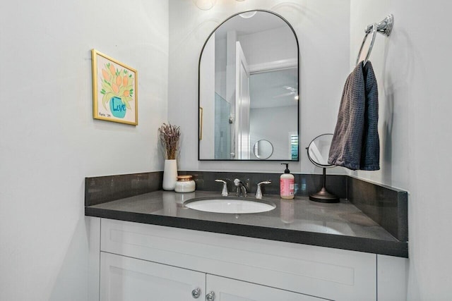 bathroom featuring vanity and ceiling fan