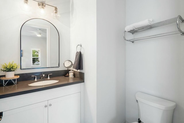 bathroom featuring toilet and tiled shower / bath