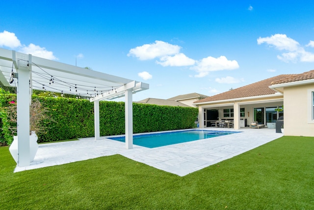 view of pool with a patio area, a pergola, and a yard