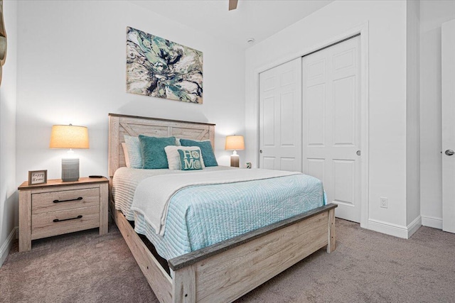 bedroom featuring carpet, a closet, and ceiling fan