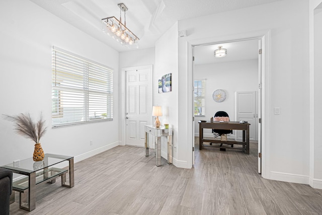 foyer with light hardwood / wood-style flooring