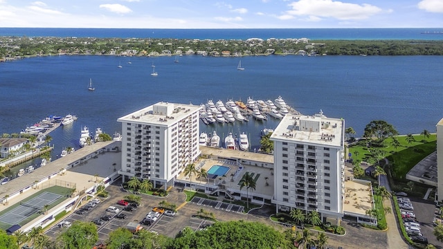 birds eye view of property featuring a water view