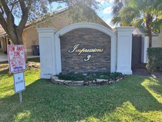 11055 Lakeaire Cir, Boca Raton, FL 33498 - community / neighborhood sign with a lawn