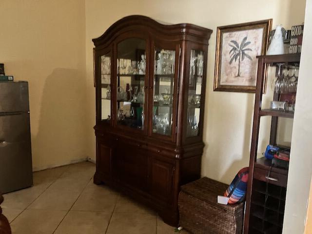 interior space with black fridge