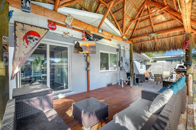 wooden deck with outdoor lounge area