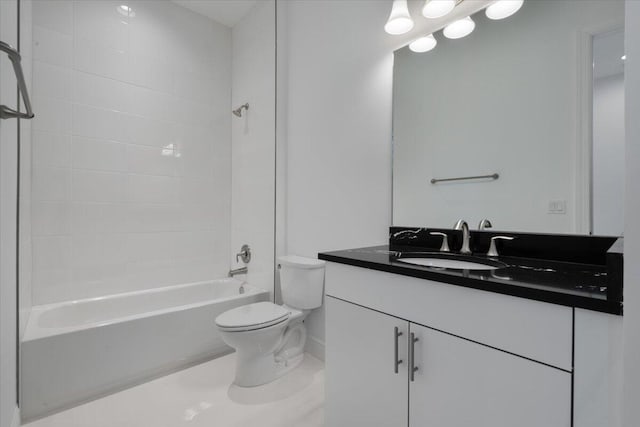 full bathroom with vanity, toilet, and tiled shower / bath