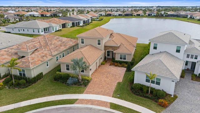 drone / aerial view with a water view