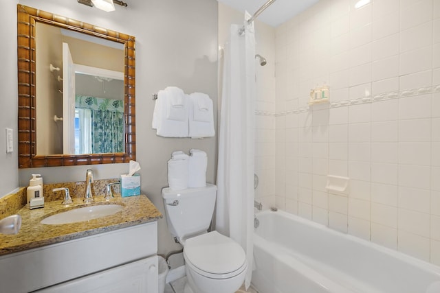 full bath featuring vanity, toilet, and shower / tub combo with curtain