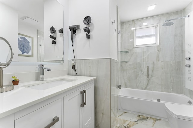 full bathroom with vanity, enclosed tub / shower combo, and toilet