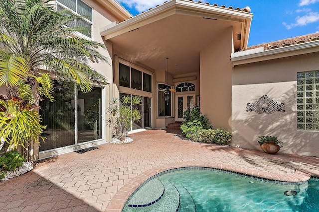 view of swimming pool with a patio area