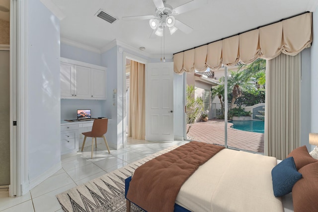 tiled bedroom featuring ceiling fan, access to exterior, built in desk, and crown molding