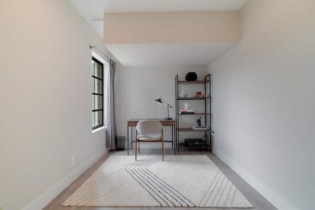 sitting room with light wood-type flooring